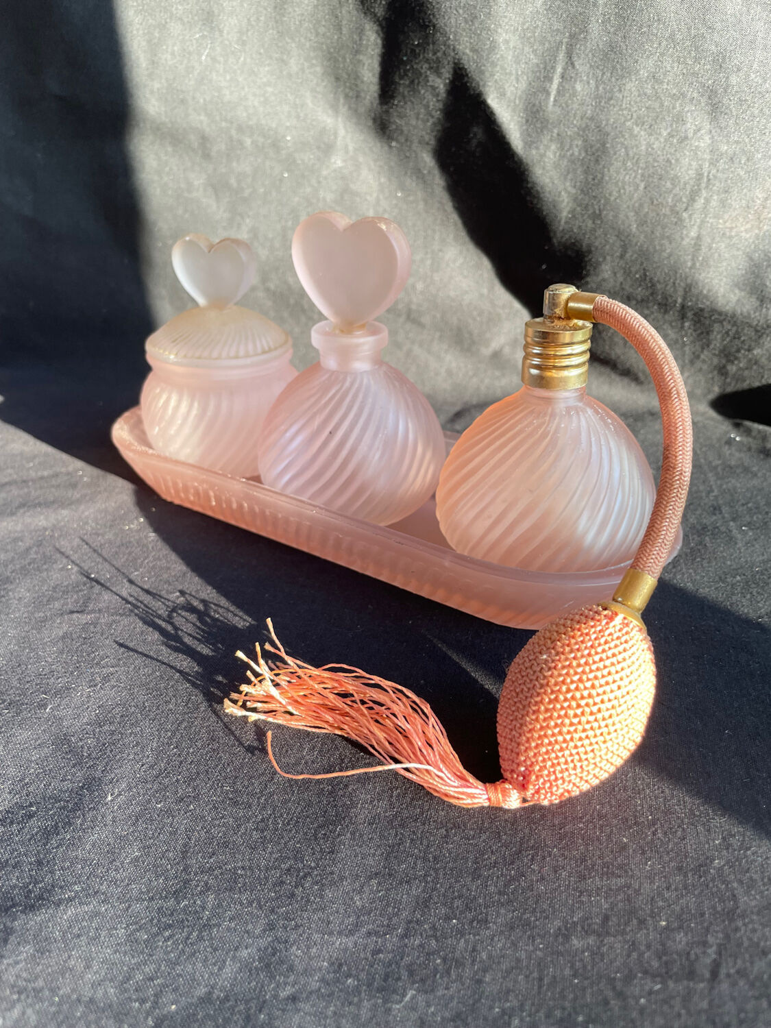 Set of vintage glass pink perfume bathroom jars