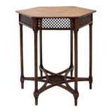 Hexagonal pedestal table or side table with a lattice structure and star pattern.