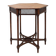 Hexagonal pedestal table or side table with a lattice structure and star pattern.