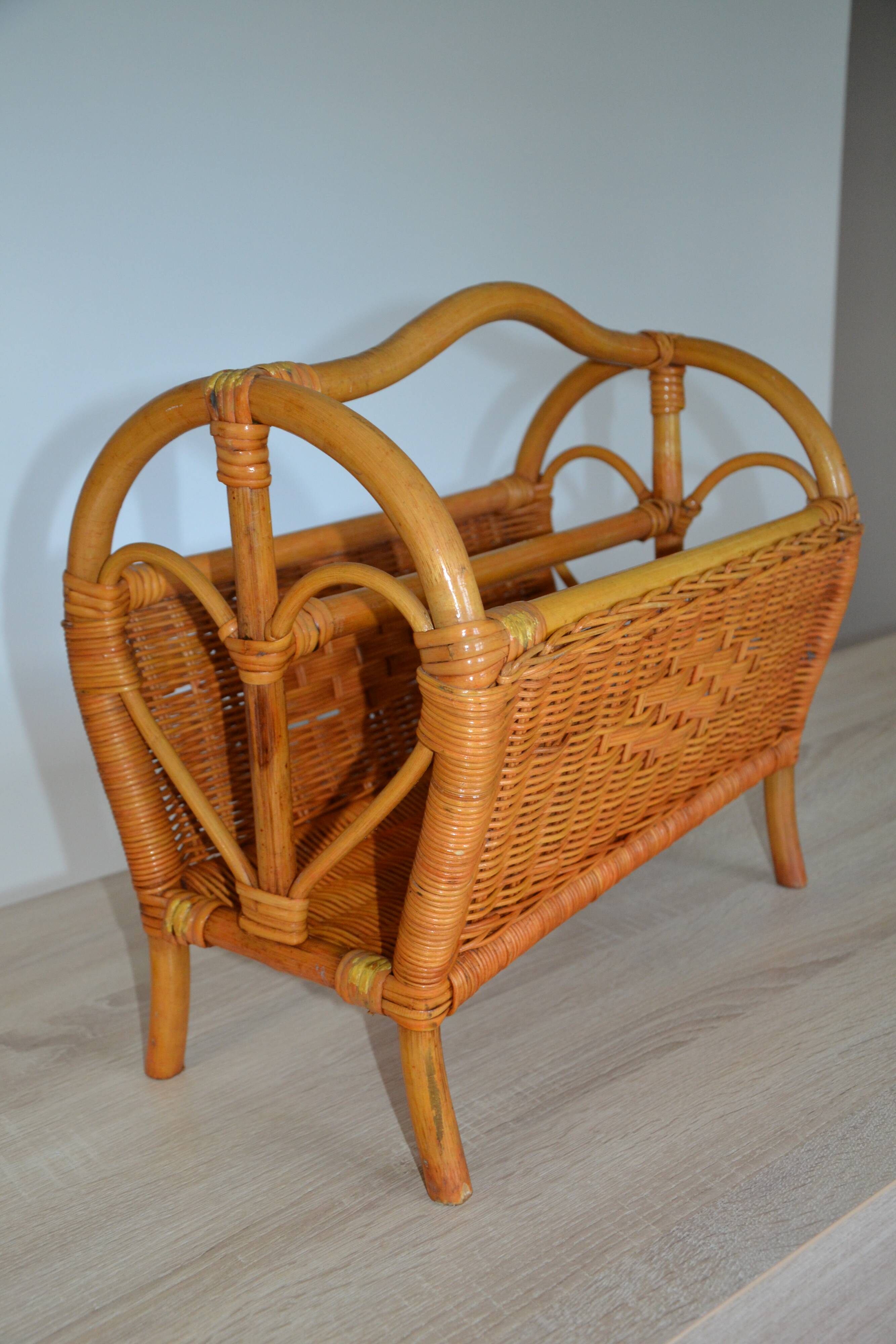Vintage woven rattan magazine rack
