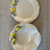 Plate and colander of lemons in slipware