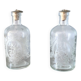 Pair of antique wheel-engraved glass bottles - good condition