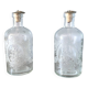 Pair of antique wheel-engraved glass bottles - good condition