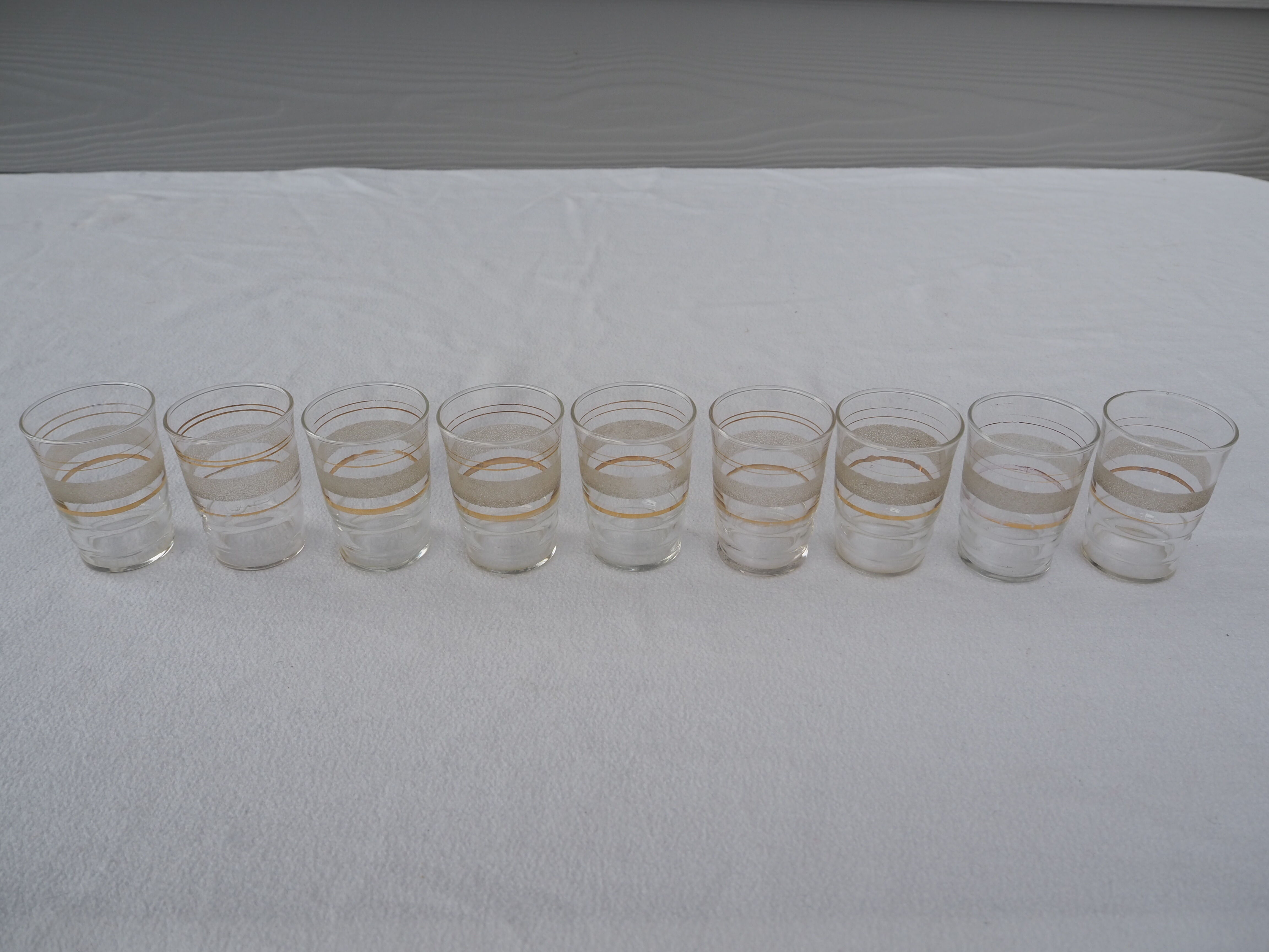 9 wine glasses, gold edging and granite – 1960s-1970s