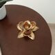 Bougeoir fleur vintage en laiton doré