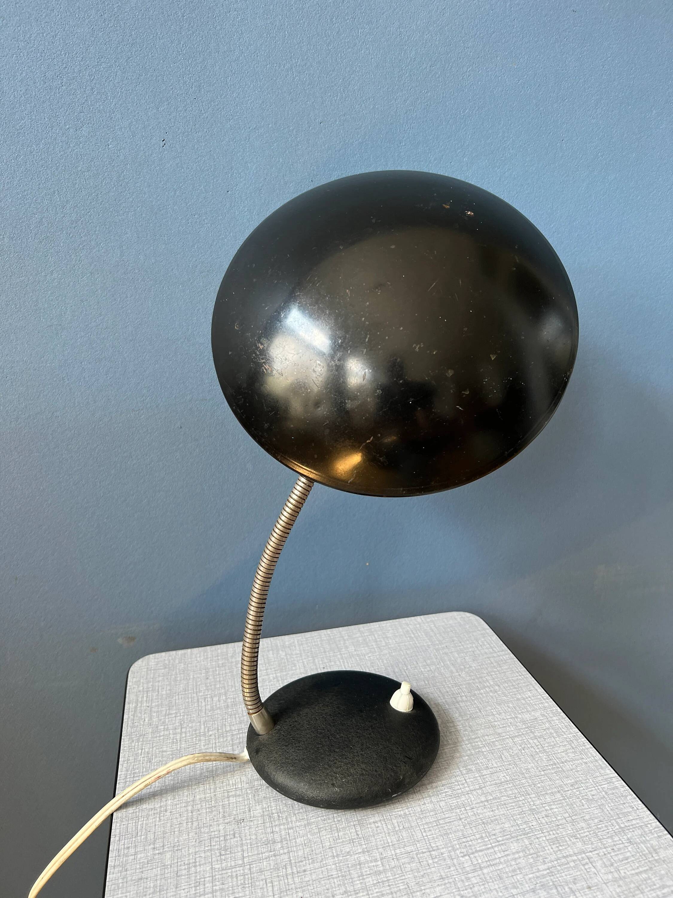 Small black metal desk lamp in Bauhaus style.