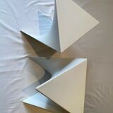 Pair of unmarked triangular white design stools