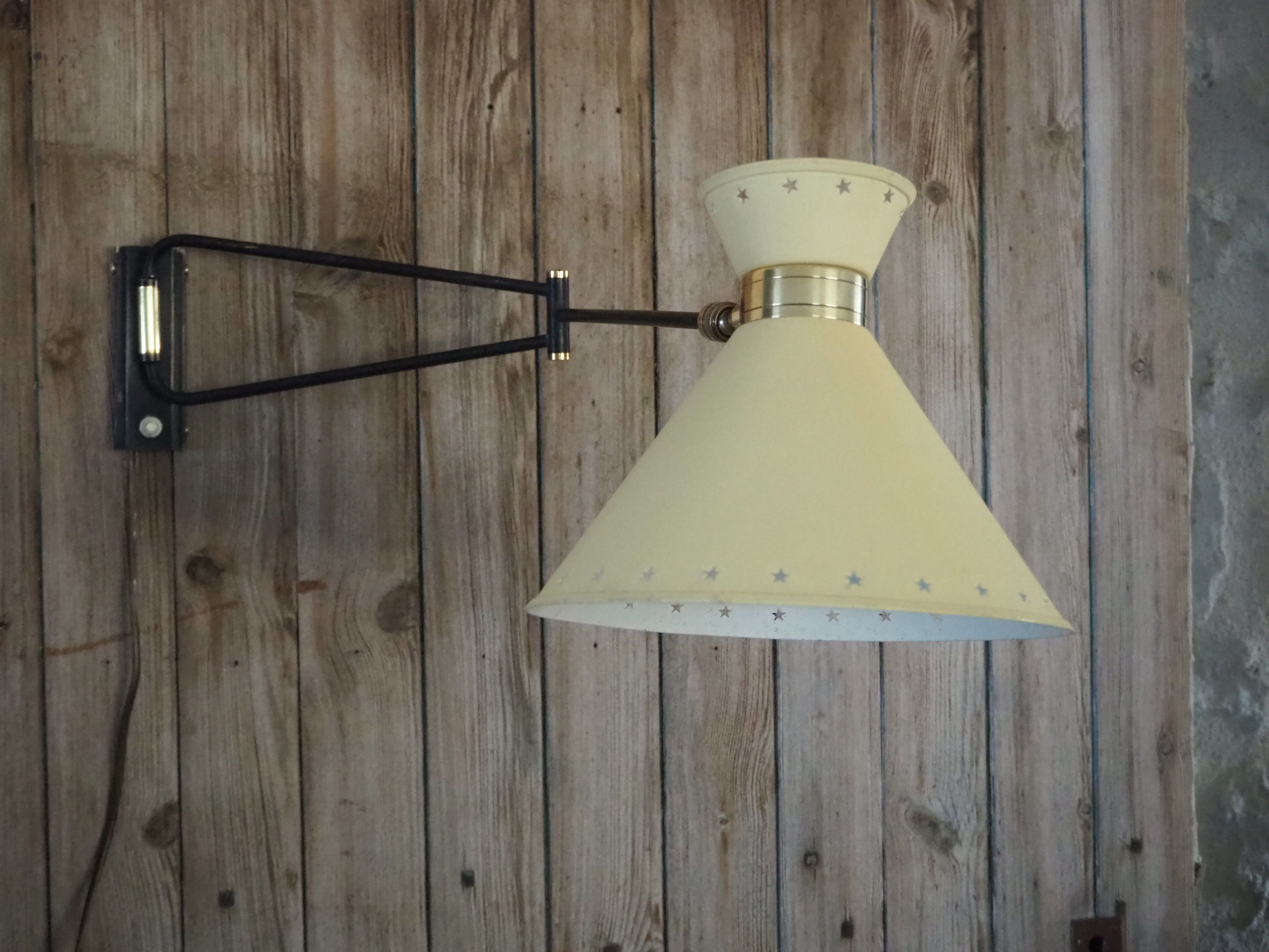 Diabolo articulated wall lamp by designer René Mathieu