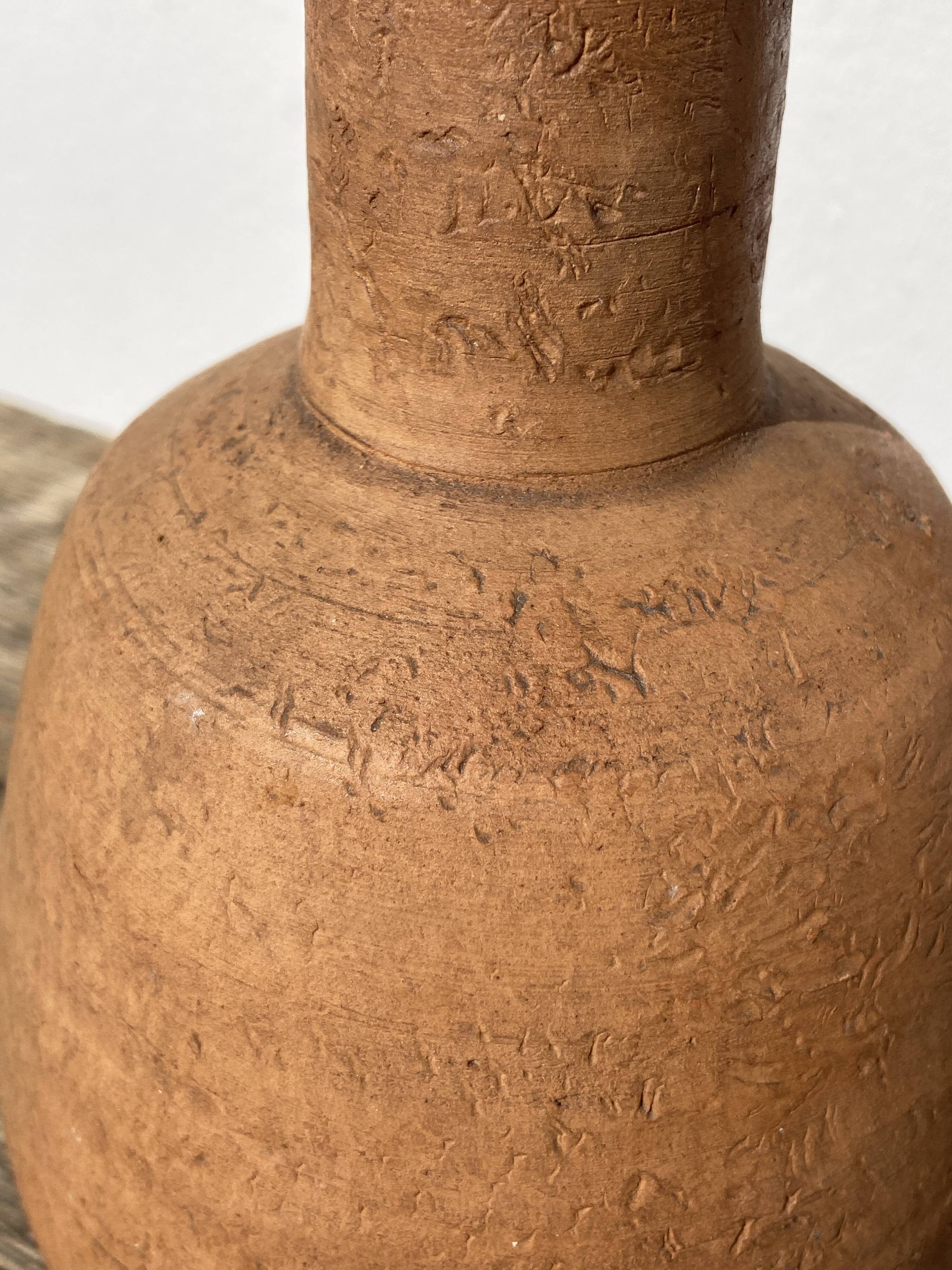 Pottery in terracotta jar in ancient ceramic signed ethnic