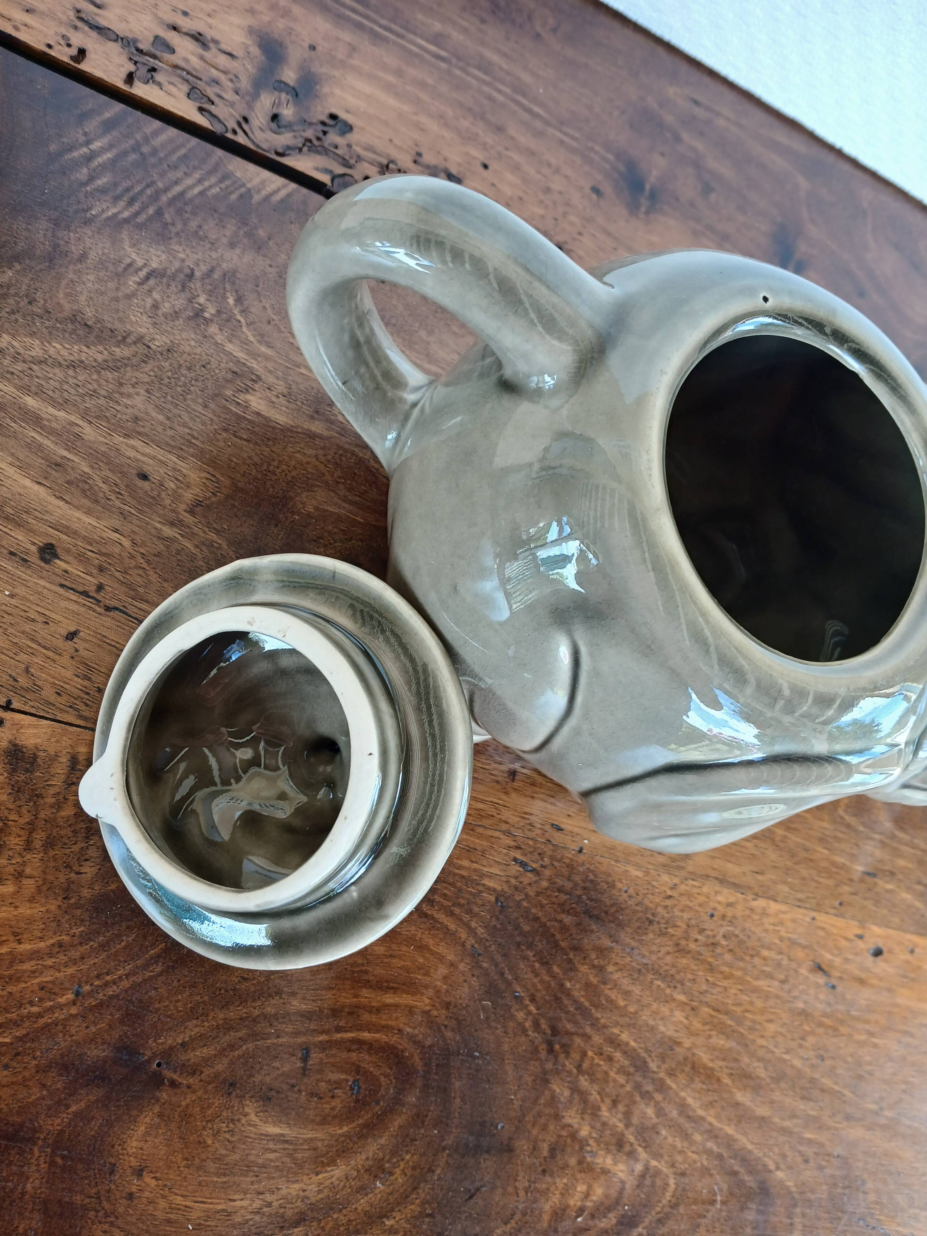 vintage ceramic teapot in the shape of a grey elephant