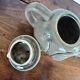 vintage ceramic teapot in the shape of a grey elephant