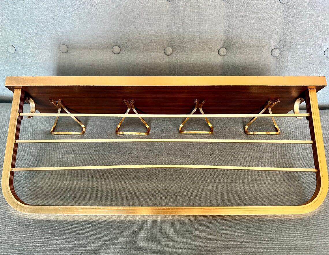 Vintage coat rack with 1970s repai décor