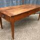 Antique cherry farmhouse table with 2 drawers and 1 pull-out