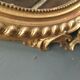 Oval mirror with wooden pediment and gilded stucco oval ice beveled Napoleon III - 80x120cm