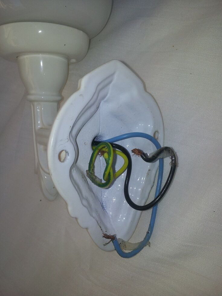 Pair of white wall sconces