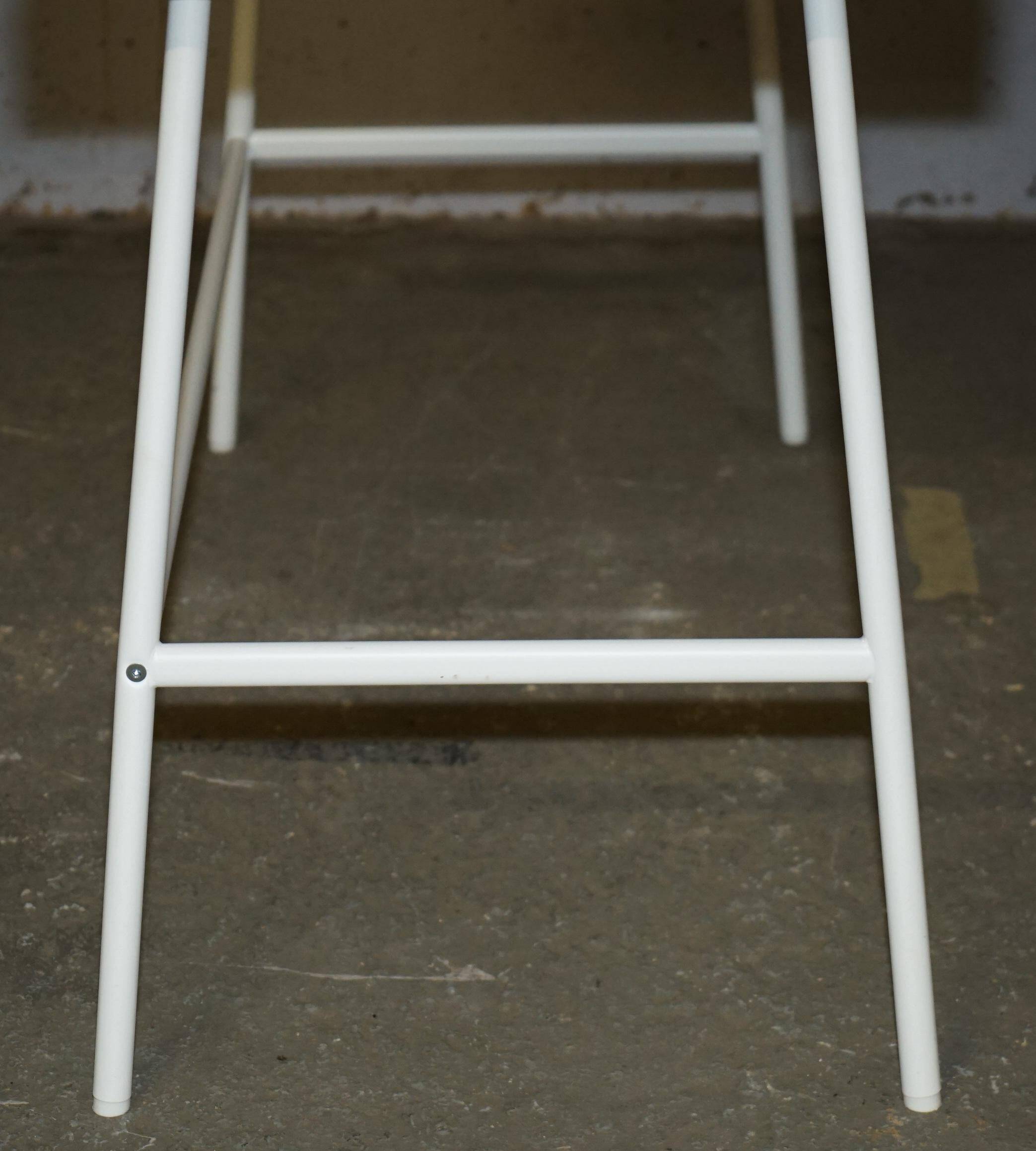 Small bamboo desk with three drawers.