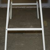 Small bamboo desk with three drawers.