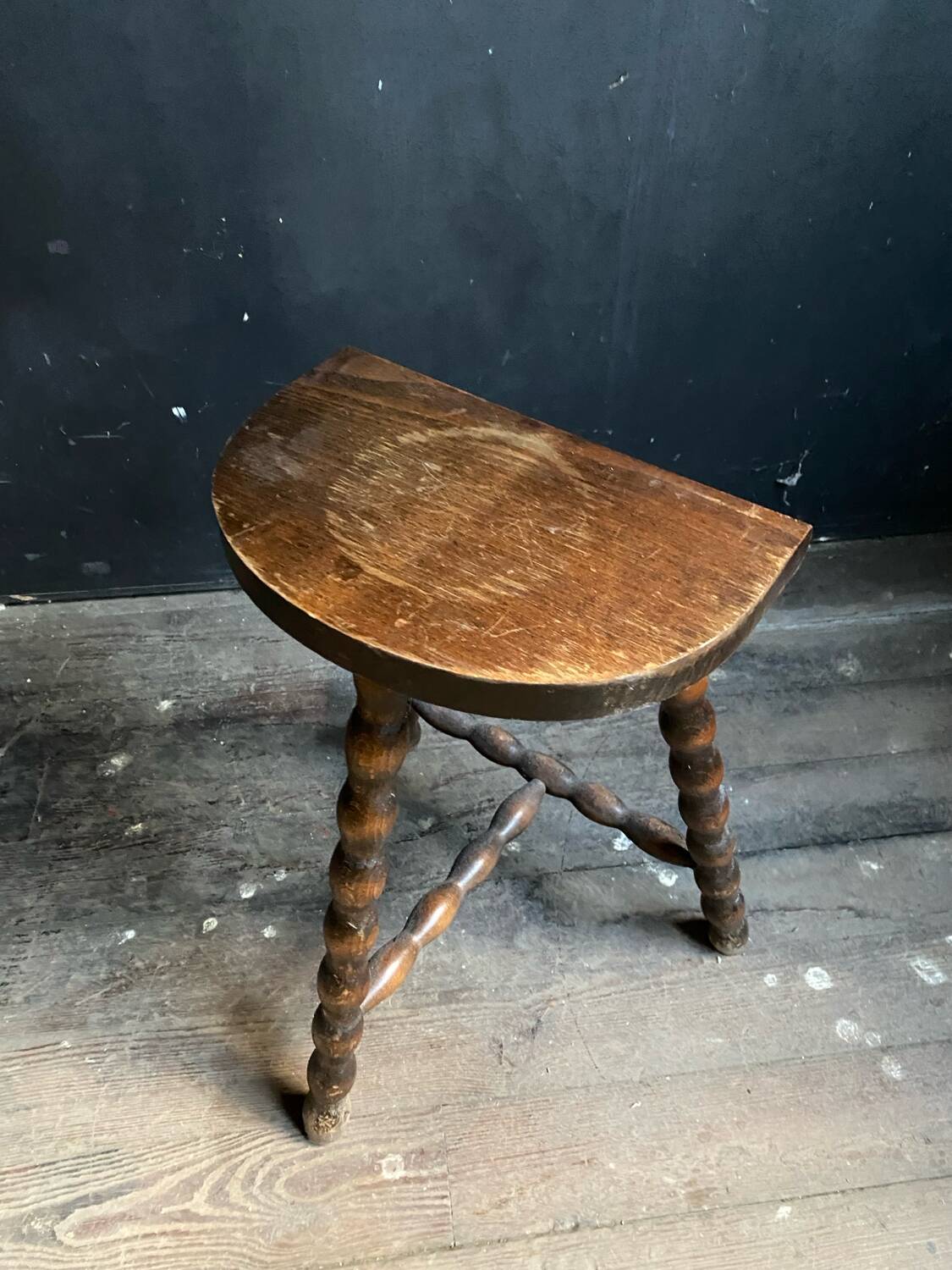 Half moon wooden milkman stool