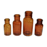 Suite de quatre vases soliflore flacons bouteilles d'apothicaire