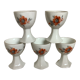 Five old egg cups with orange and grey flowers, polygonal base.