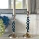 2 candle holders in brass and ceramic 1950