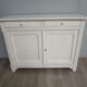 Off-white sideboard with 2 doors and 2 drawers
