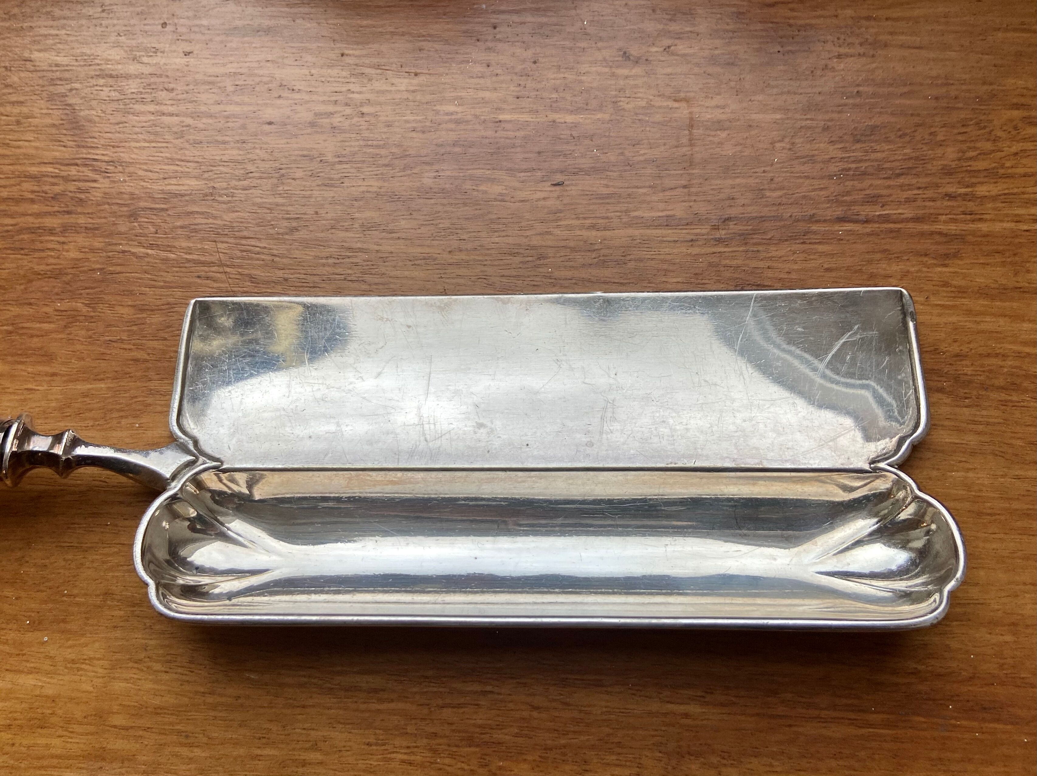 Old silver metal crumb tray