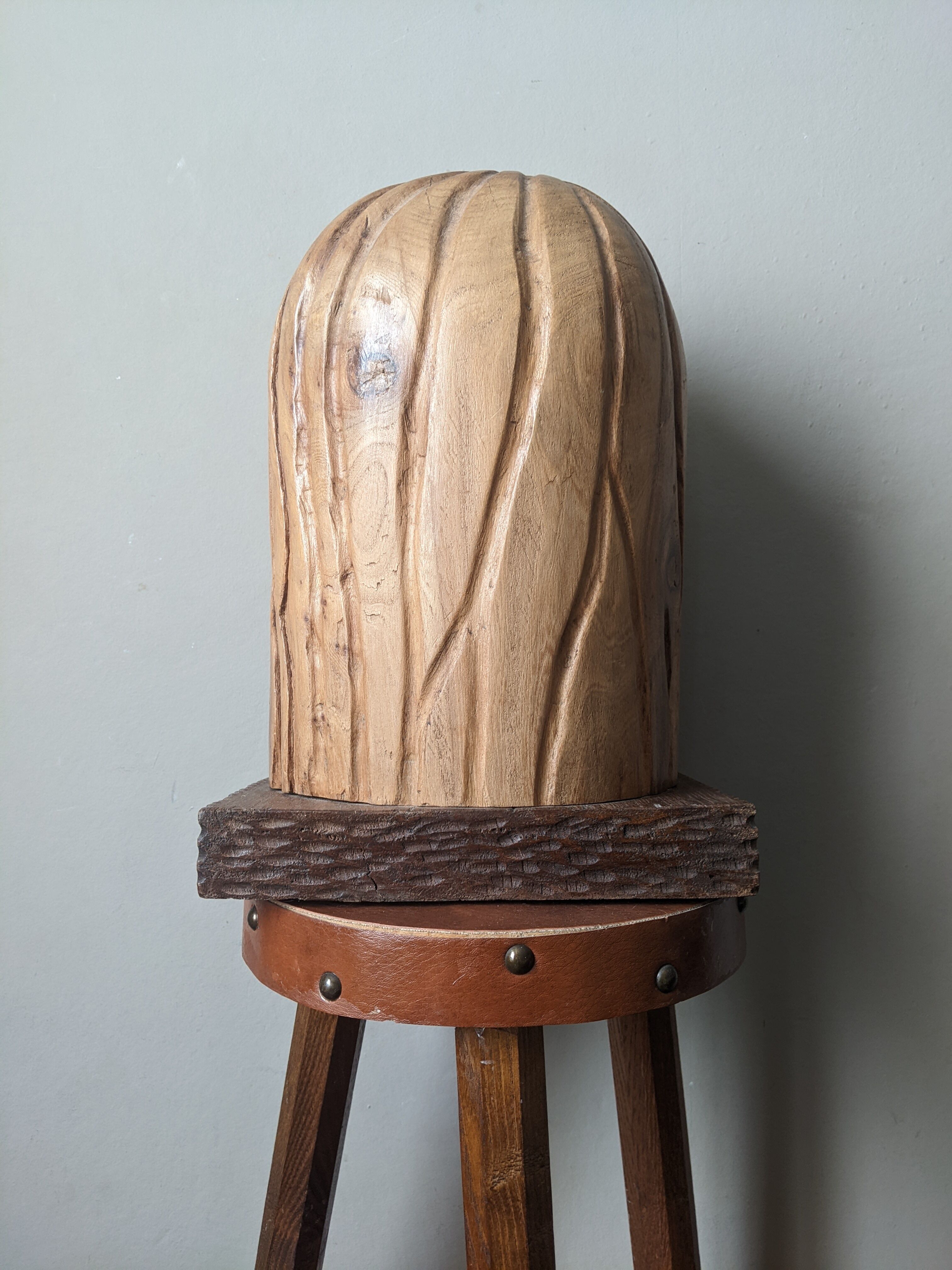 Handcrafted sculpture of the head of Christ in elm.