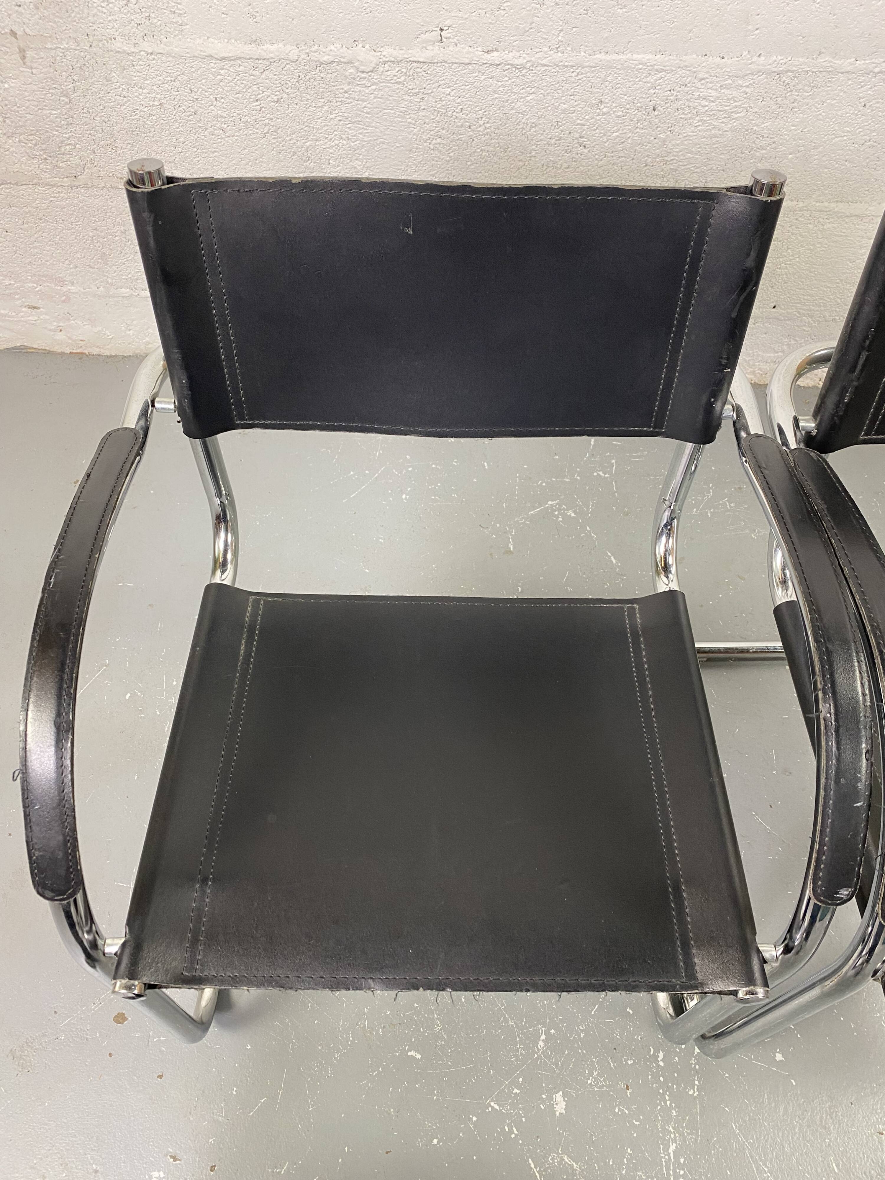 Pair of design armchairs in imitation leather chrome
