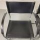 Pair of design armchairs in imitation leather chrome