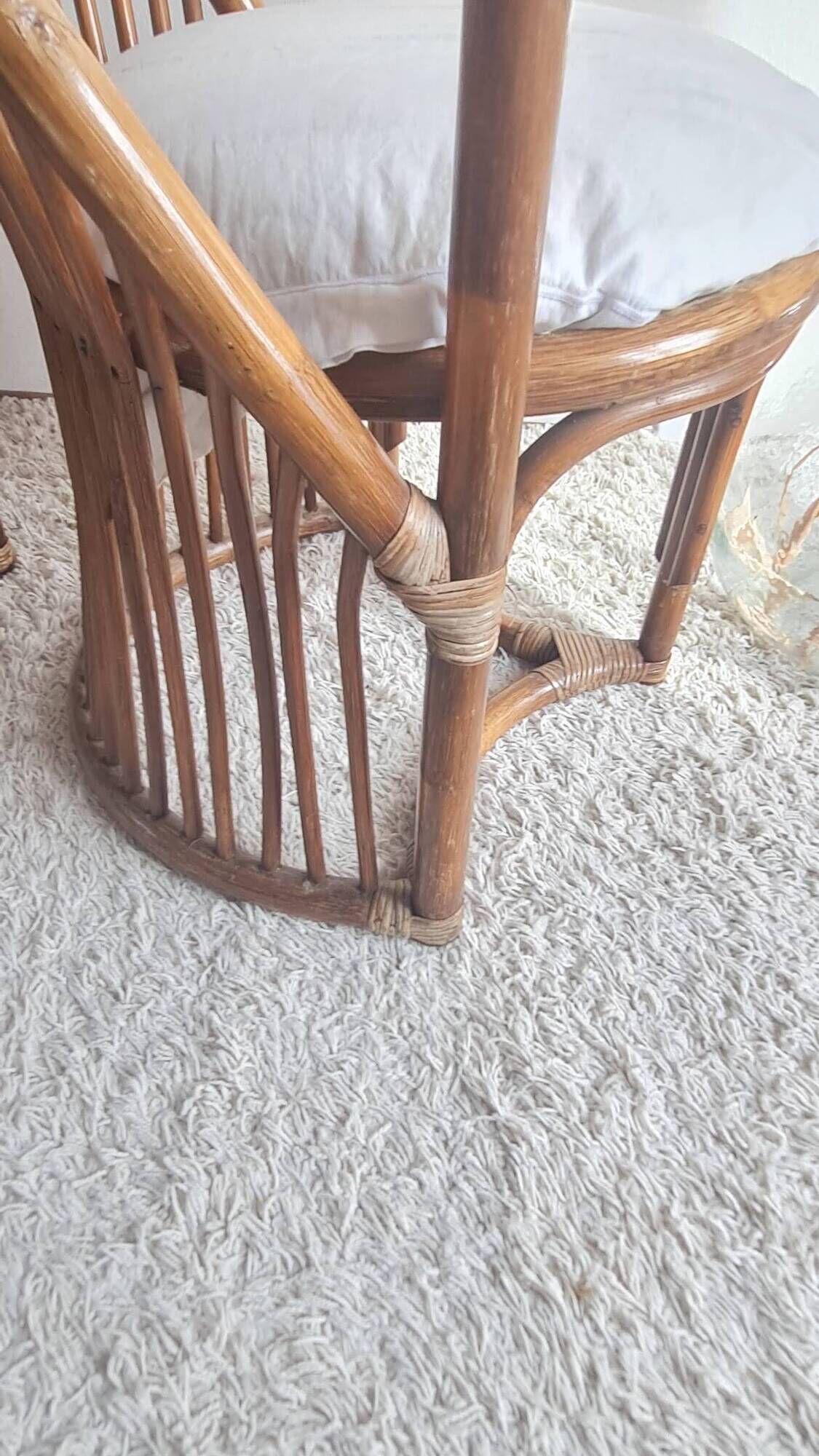 Pair of vintage rattan armchairs circa the 1960s.