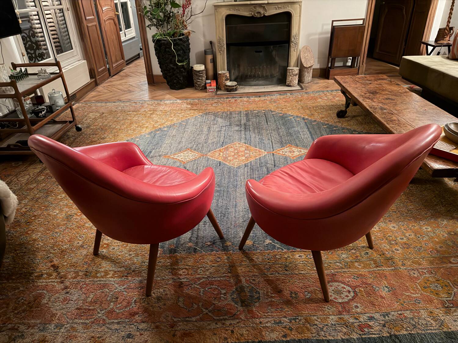 2 Hans Olsen armchairs, 1950s, red leather finish.