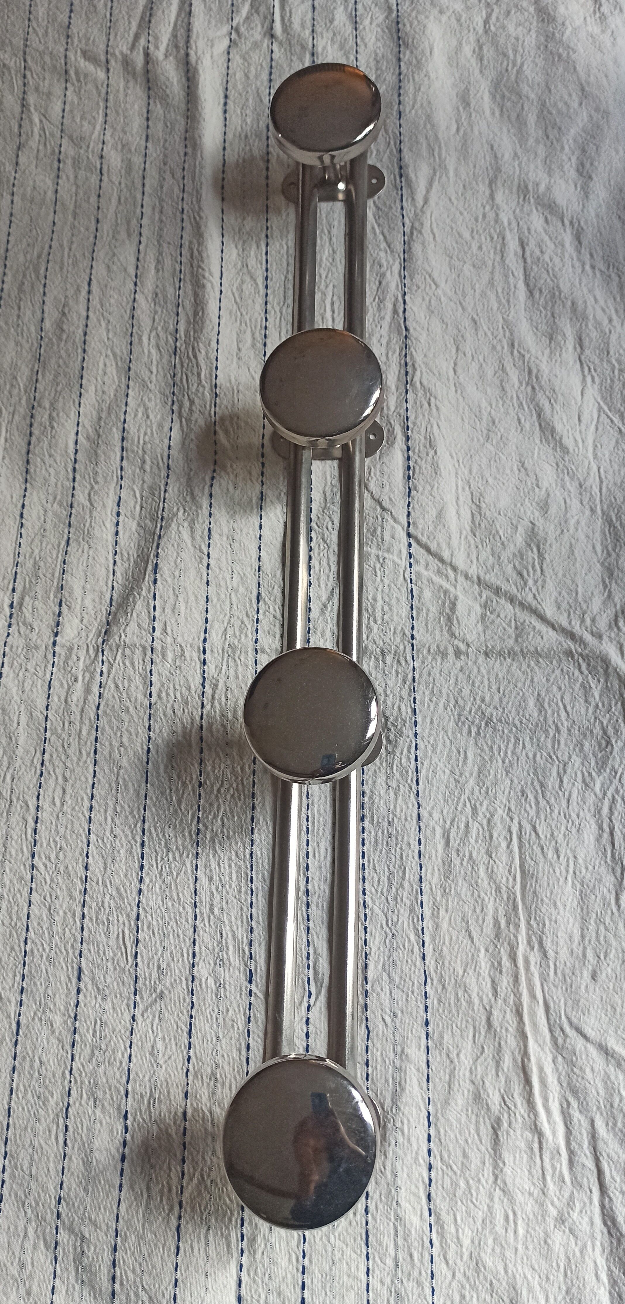 Metal wall coat rack