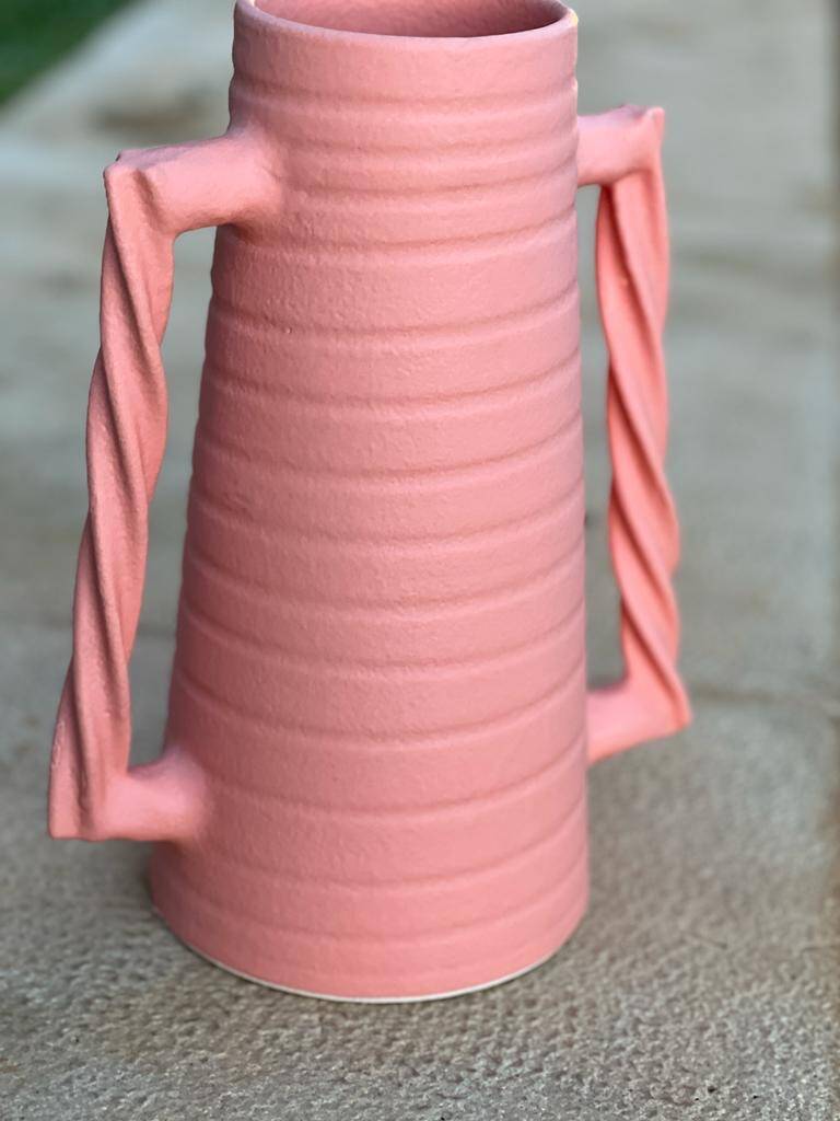 Ceramic vase with wavy handles