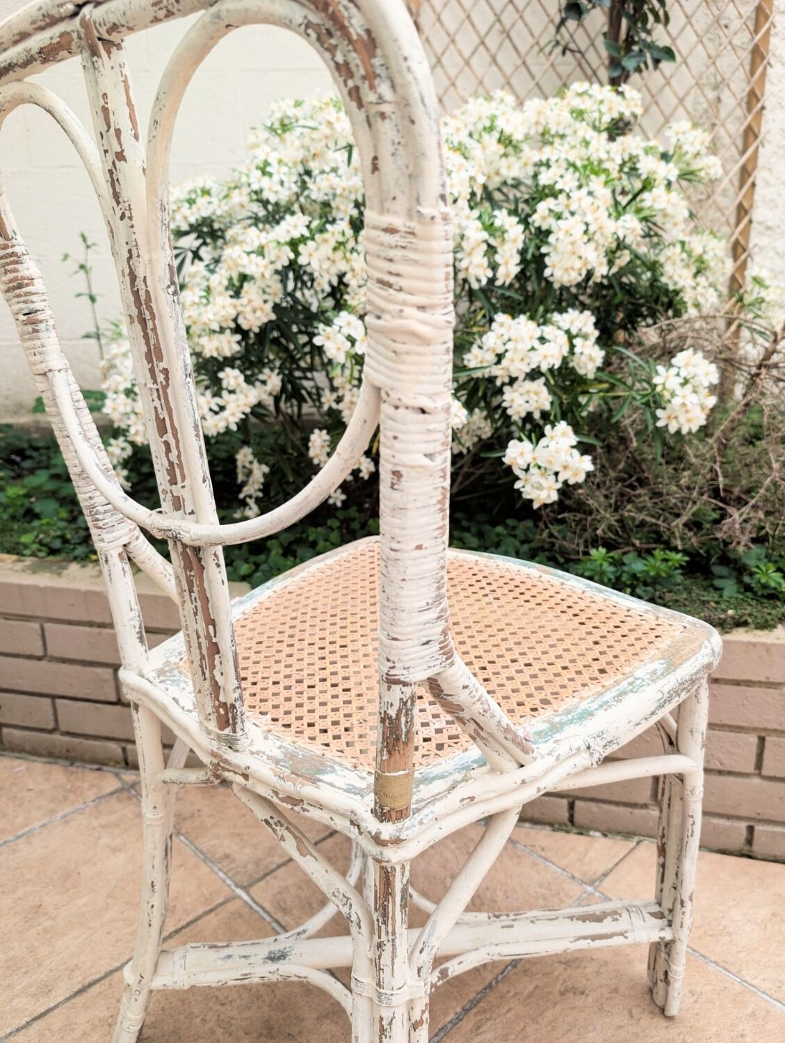 Pair of vintage restaurant chairs in rattan