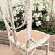 Pair of vintage restaurant chairs in rattan
