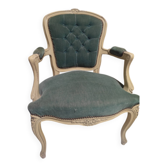 Antique upholstered armchair