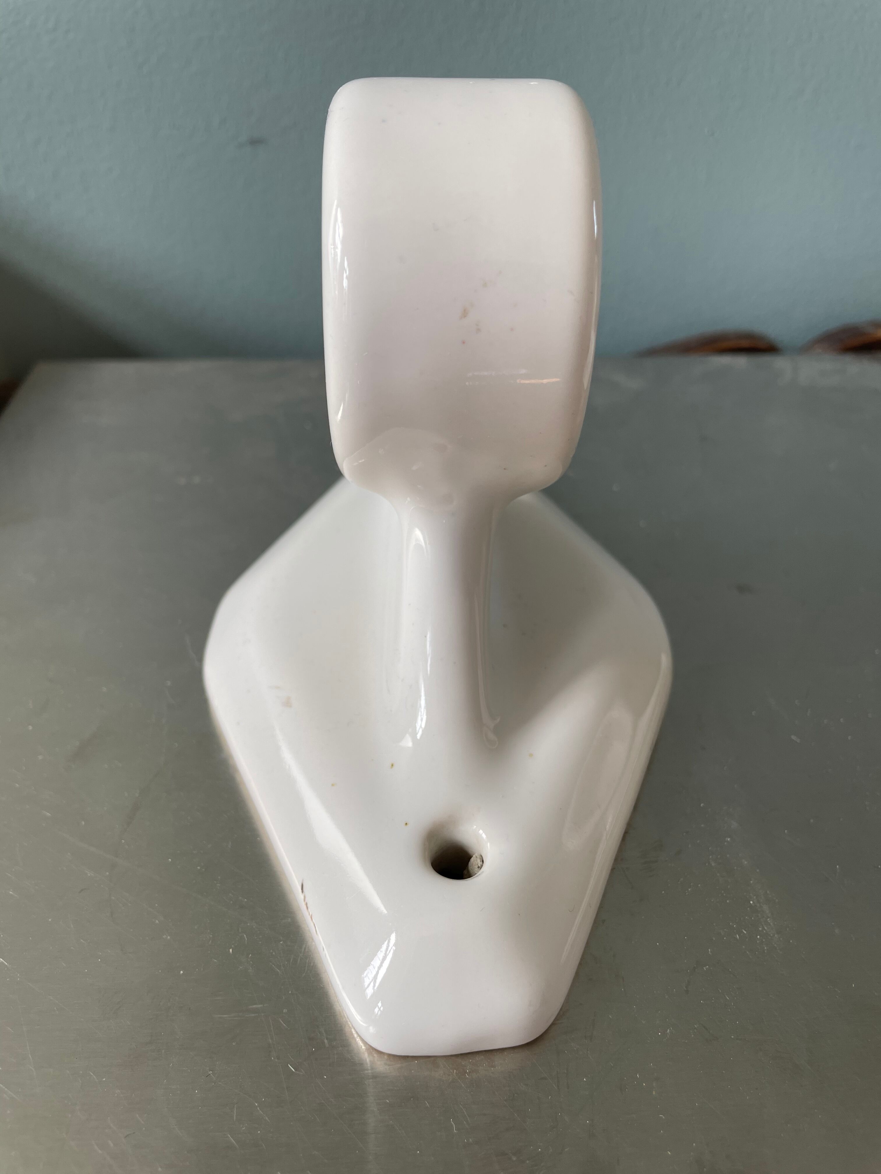 White porcelain towel rack, early twentieth century