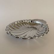 Large silver-plated serving dish in the shape of a vintage shell.