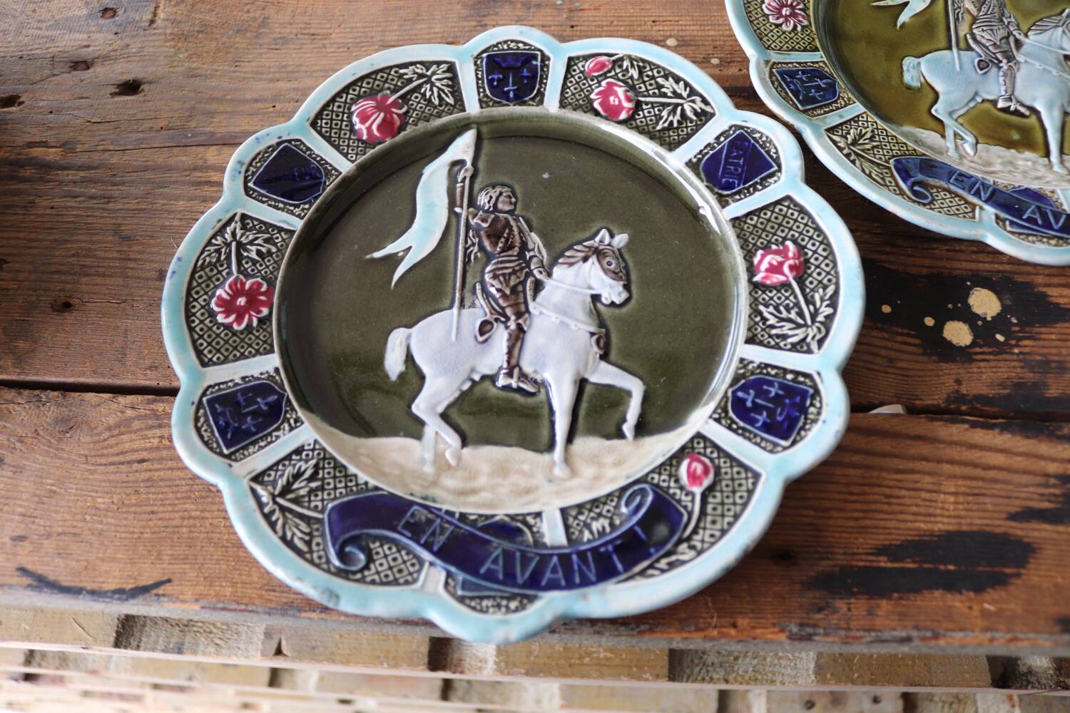 3 antique barbotine plates featuring Joan of Arc "En Avant"