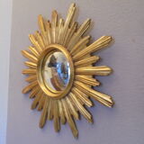 Sun mirror in golden resin from the 70s