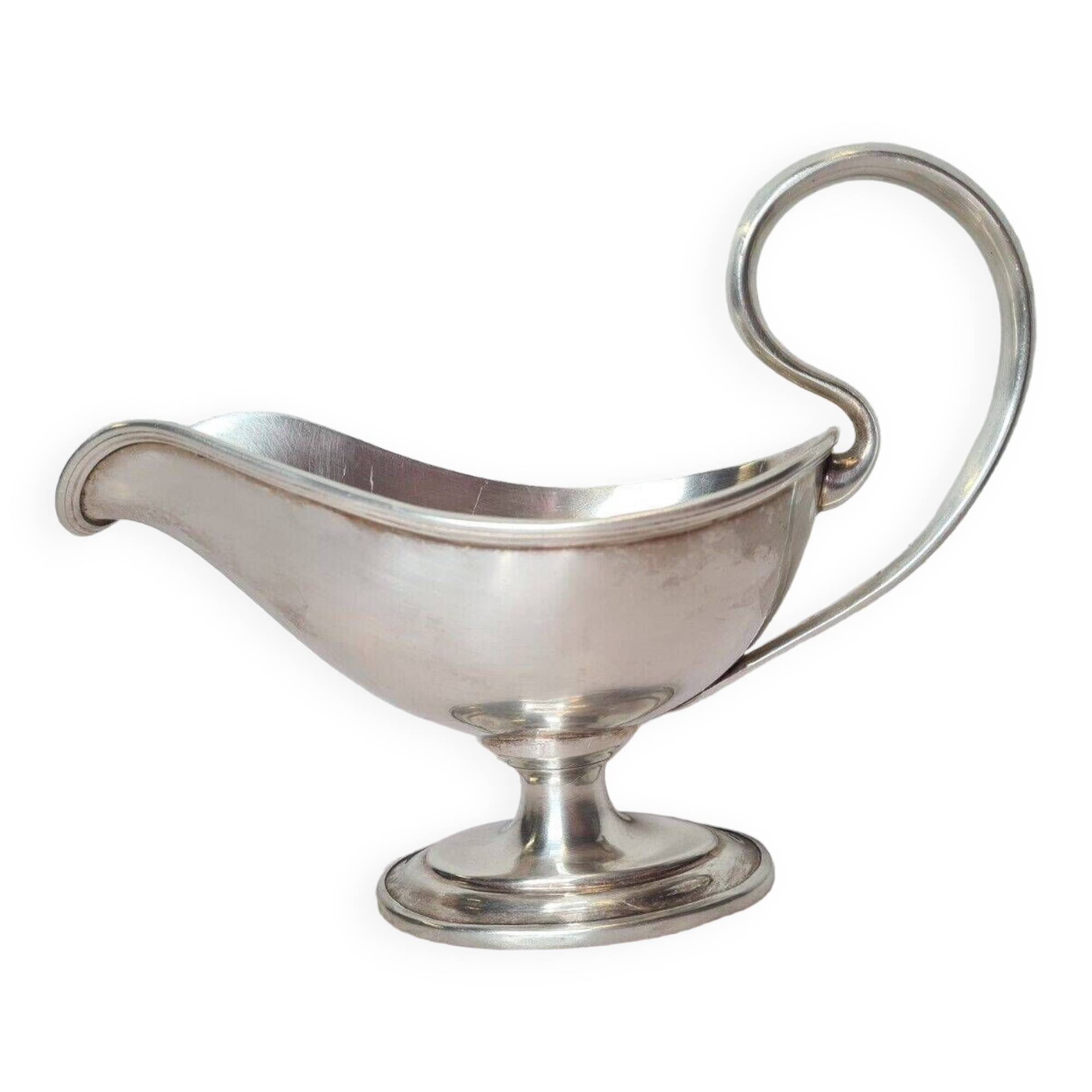 silver metal gravy boat