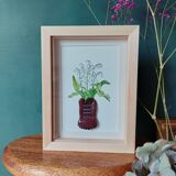 Composition d'un bouquet des muguets dans un pot en argile en forme the chaussure