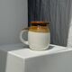 Small two-tone white and brown pitcher Made in China