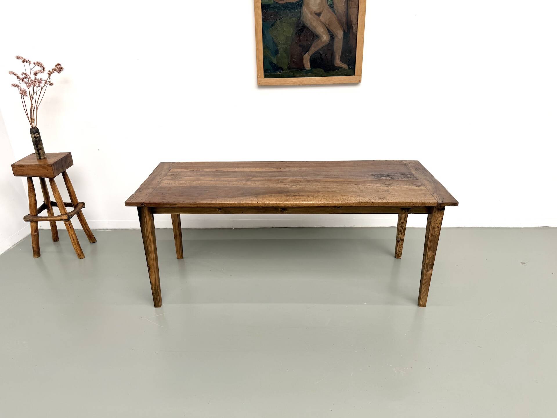 Farm table in walnut with spindle legs.