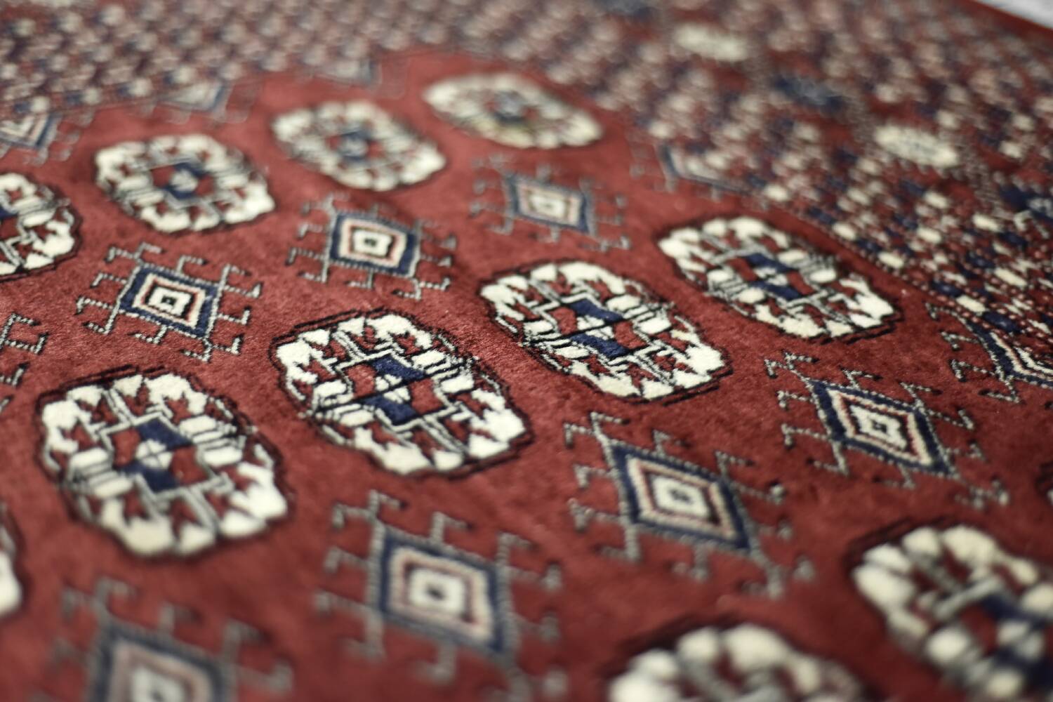 Handwoven red Boukhara oriental rug, 1960s