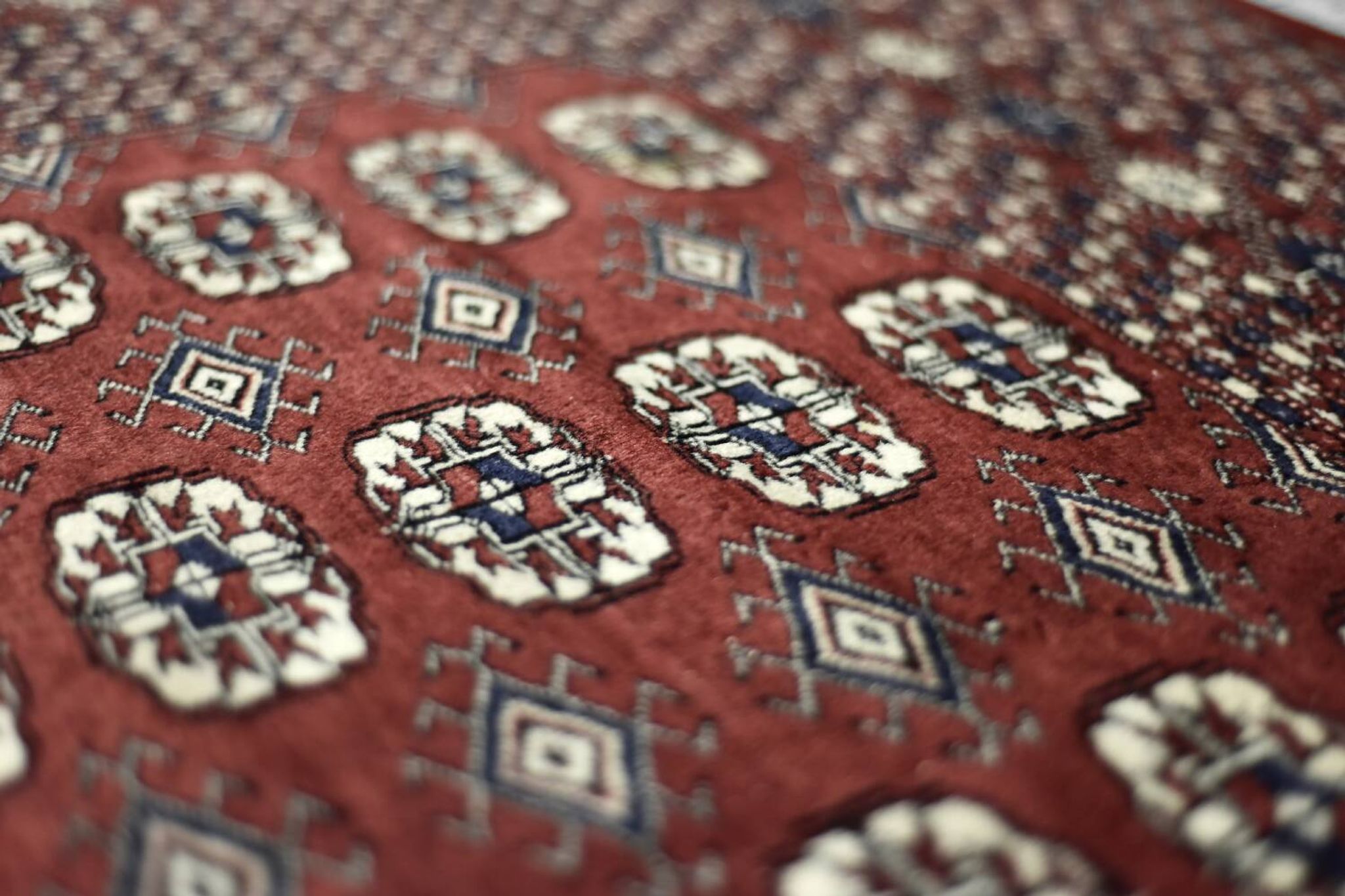 Handwoven red Boukhara oriental rug, 1960s