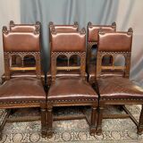 Renaissance-oak and leather style chairs