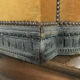 Old wooden chest and yellow velvet