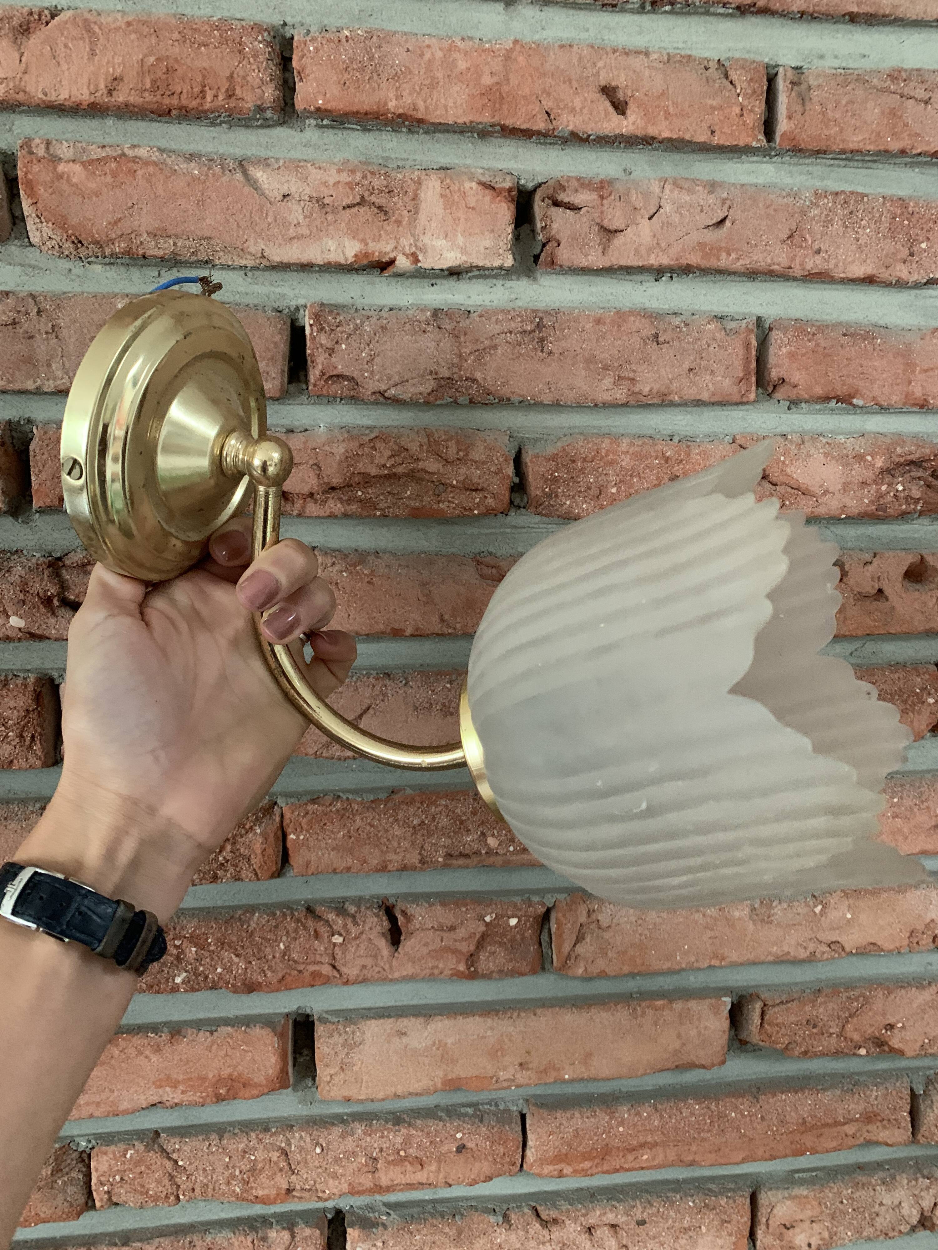 Brass and glass sconce